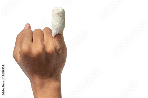 Hand with little finger injury With a white bandage