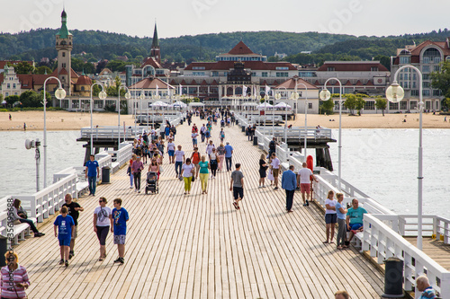 Sopot, Poland - Juny, 2019: The Sopot Pier in the city of Sopot built in 1827. At 511m, the pier is the longest wooden pier in Europe in Sopot, Poland.