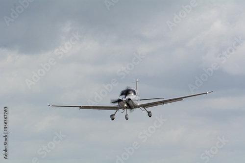 Small general aviation airplane coming to land