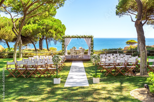 Beautiful wedding by the ocean, outdoors. Close-up.