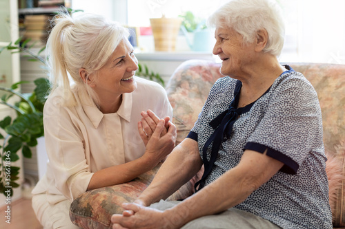 Woman spending time with her elderly mother