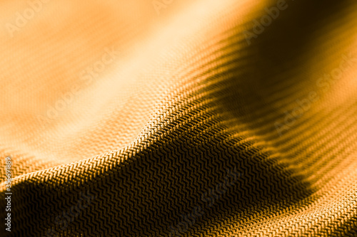 Golden fabric as an abstract background.