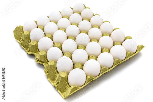 White eggs cartoon box on white background. Cartela com ovos.