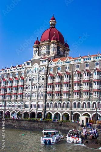 Mumbai India Nov 9th 2019: The Taj Mahal Palace Hotel and pier, is a heritage, five-star, luxury hotel built in the Saracenic Revival style in the Mumbai, situated next to the Gateway of India. 