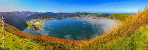 Panorama of the crater lake Lagoa do fog, famous hiking oportunity at the island of Sao Miguel, Azores islands, Portugal