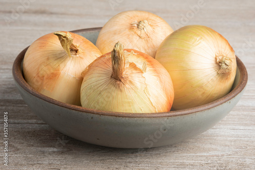 Whole Sweet Onions In A Bowl