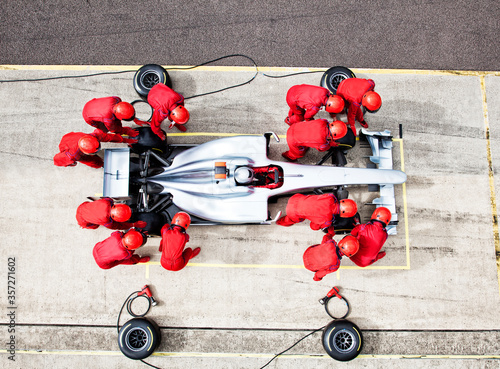 Racing team working at pit stop