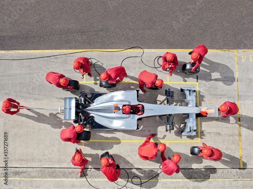 Racing team working at pit stop