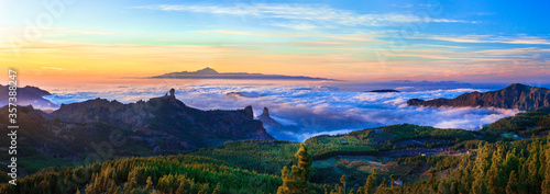 Grand Canary island. Mirador Roque Nublo . Breathtaking mountains over sunset and view of Tenerife .