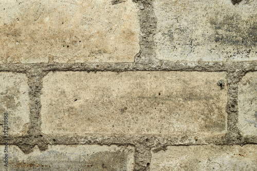 Texture of white silicate brick, a seam of brickwork on a brick wall.