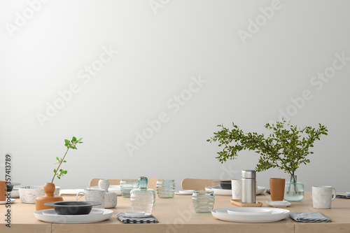 Blank white wall mock up in the dinning room with served table. 3d render