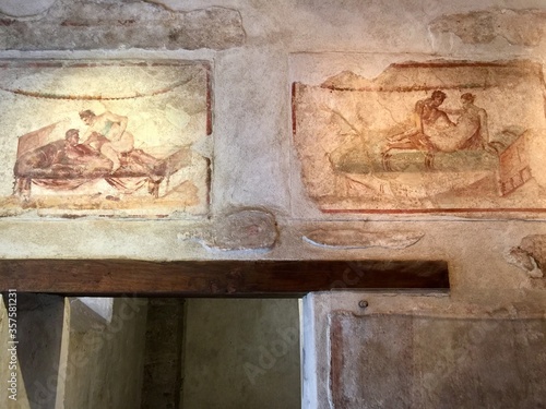 Erotic frescos of lupanar, the ancient Roman brothel in Pompeii