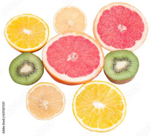 sliced oranges grapefruits kiwi lemons isolated on white