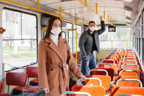 Passengers on public transport during the coronavirus pandemic keep their distance from each other. Protection and prevention covid 19