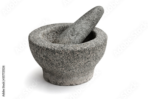 Stone mortar and pestle isolated on white background