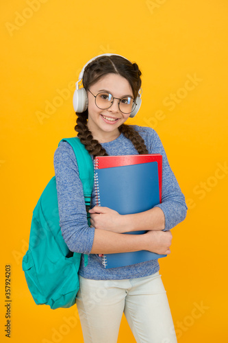 Modern schoolgirl daily life. School club. School system functions. Private schooling. Teen with backpack. Cute smiling schoolgirl. Girl little schoolgirl carry backpack. Pupil going to school