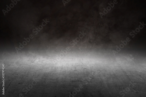 Concrete floor with smoke and light