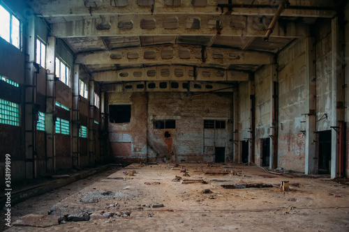 Old broken empty abandoned industrial building interior