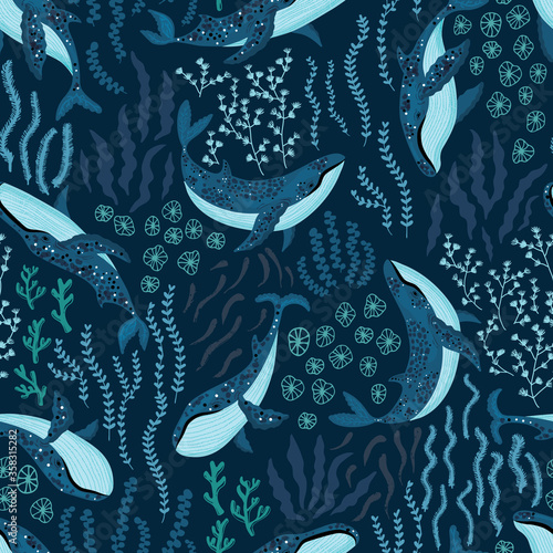 Seamless pattern with underwater humpback whales dancing under the sea on dark blue background. Vector illustration with whales in riverbed surrounded by seaweed and algae.