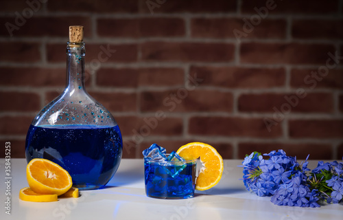 blue mojito cocktail with orange