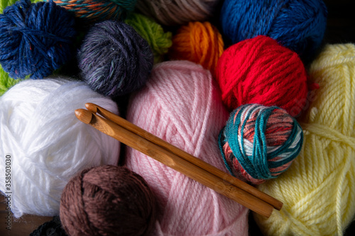 Yarn balls and crochet needles.