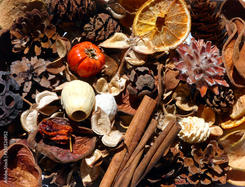 A close-up background mixture of dried woodland potpourri items. 