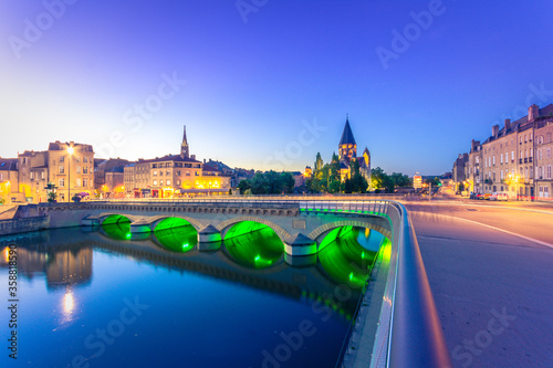 View of Metz with Temple Neuf reflected in the Moselle River, Lorraine, France