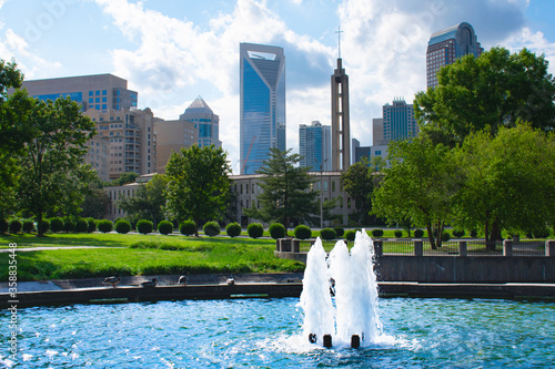 Charlotte city view from water fountain at Marshall Park in Charlotte NC.