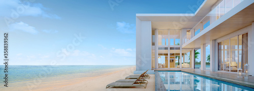 Sea view.Luxury modern beach house with swimming pool and sunbed for vacation home or hotel.3d rendering