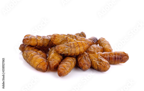 Fried silkworm pupae on a white background