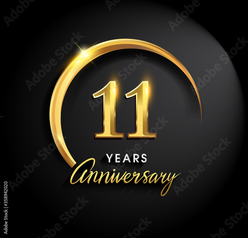 11th years anniversary celebration. Anniversary logo with ring and elegance golden color isolated on black background, vector design for celebration, invitation card, and greeting card