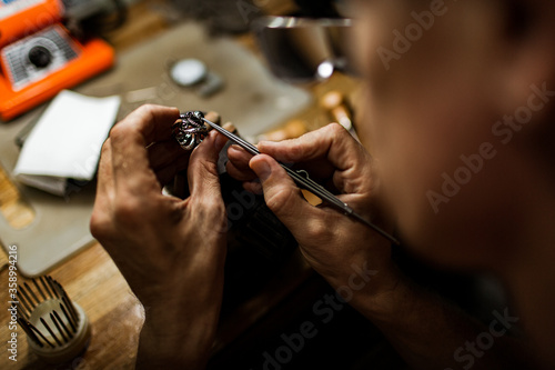 close-up. The jeweler makes a silver ring. On the island of Bali. Indonesia