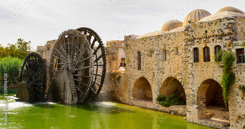 Noria of Hama, water wheel along the Orontes River in the city of Hama, Syria.