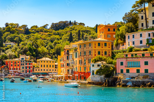 It's Portofino, is an Italian fishing village, Genoa province, Italy. A vacation resort with a picturesque harbour and with celebrity and artistic visitors.