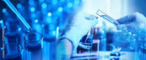 Double exposure of scientist working with reagents and test tubes, banner design. Laboratory analysis