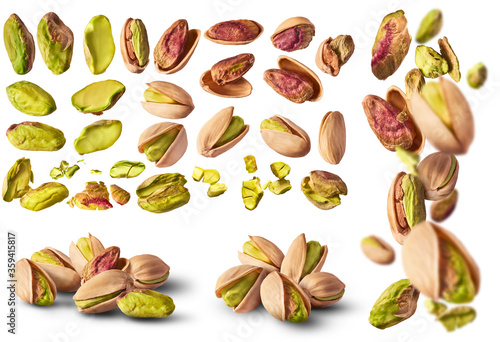 A set with Fresh raw Pistachios isolated on white background.