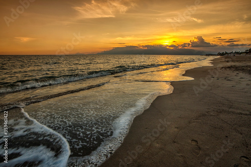 Landscape of the sunset in the Mediterranean Sea, Lara beach of Antalya province, Turkey. Lara Beach is one of the longest sand beaches in Turkey.