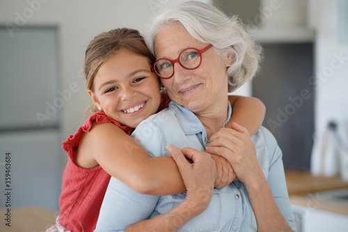 Portrait of smiling grandmother with grandkid