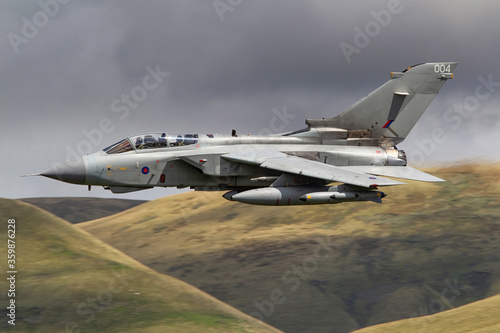 RAF (Royal Air Force) Panavia Tornado GR4 Fighter Bomber and reconnaissance jet flying low level in the UK, Cumbria, Wales and Scotland. 