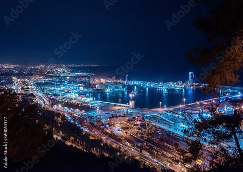 night view of the city and harbour in barcelona