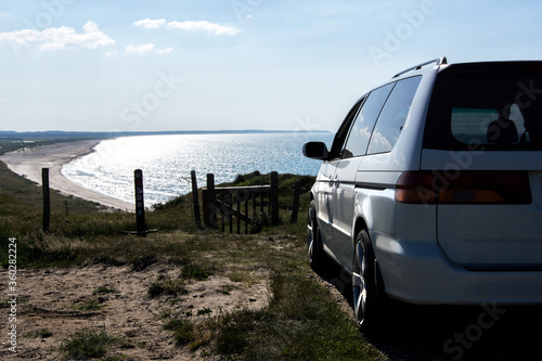 Minivan on a sand dune