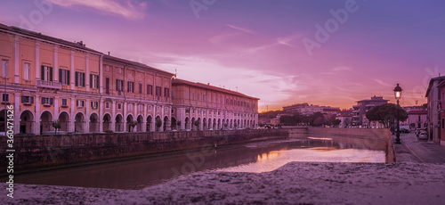 Senigallia, the Misa river crosses the historical center of the city at sunset. Marche, Italy