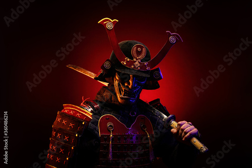 Portrait of a samurai in red armor in profile, his katana on his shoulder