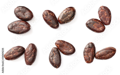 peeled cocoa beans isolated on white background, top view
