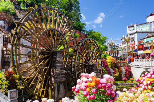 Ornamental water mills and flowers, the Old Town of Lijiang
