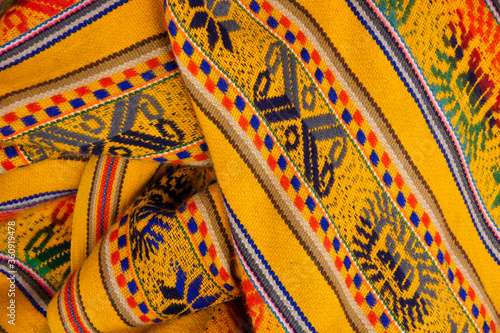 Woven textiles for sale in the market, Chinchero, Peru