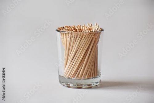 Stack of toothpicks in white