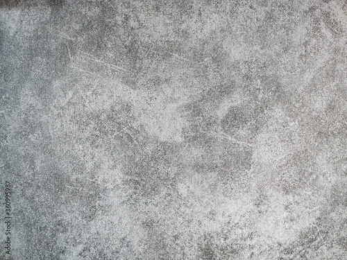 background copy space texture of abstract dark grey tinted stone concrete wall or ground scratches crack sand old aged worn grunge mood feeling effect, blank wallpaper canvas for texturing photographs