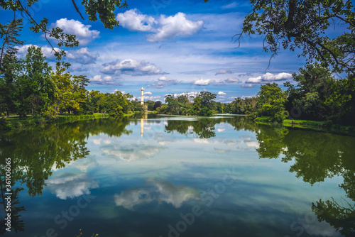 Lednice Chateau with beautiful gardens and parks on sunny summer day. Lednice-Valtice Landscape, South Moravian region. UNESCO World Heritage Site. Minaret