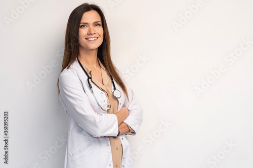 Young, smart and professional doctor isolated on white.